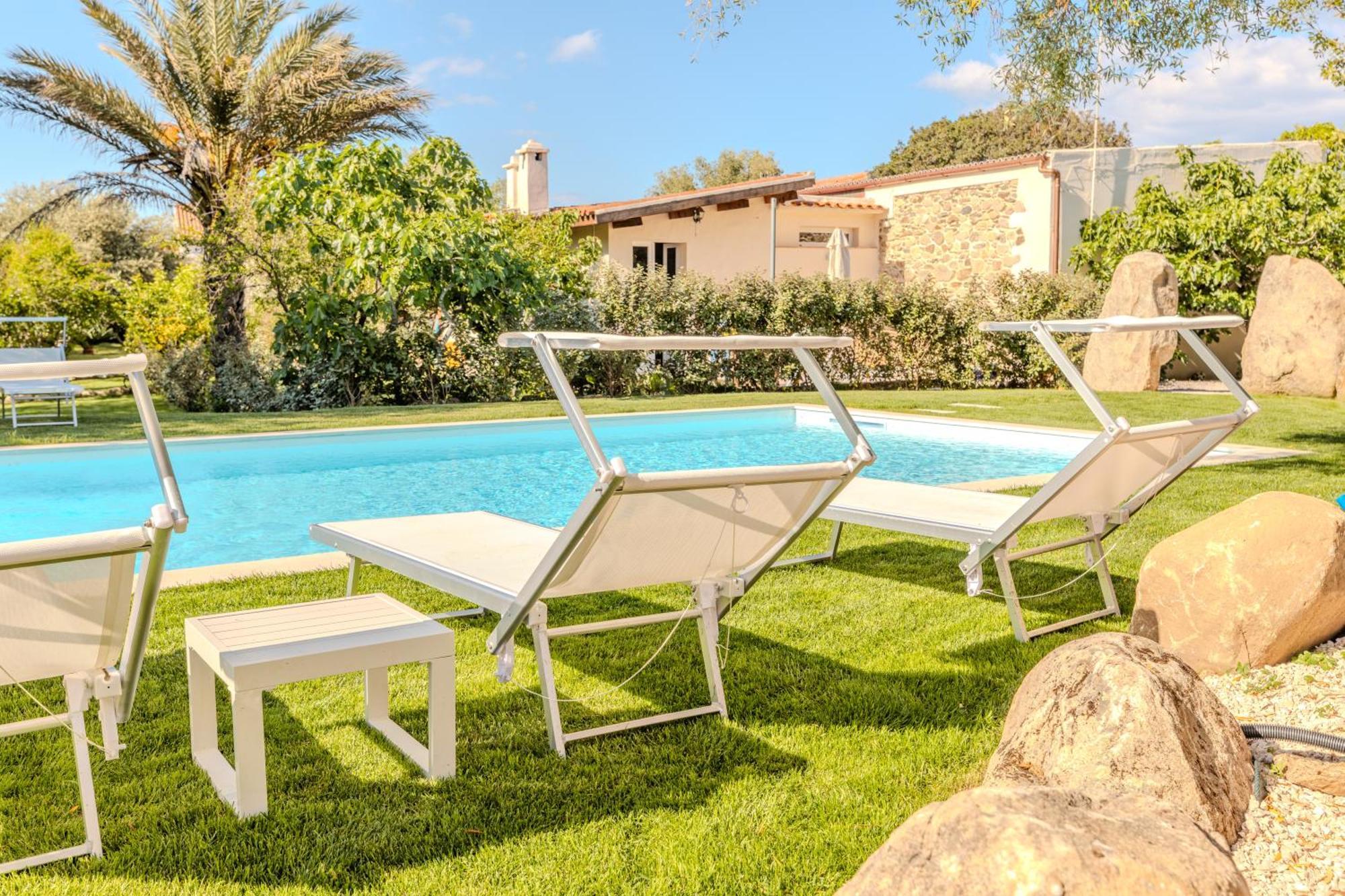 Stazzo San Teodoro Il Ginepro Piscina Condivisa Apartment Ngoại thất bức ảnh